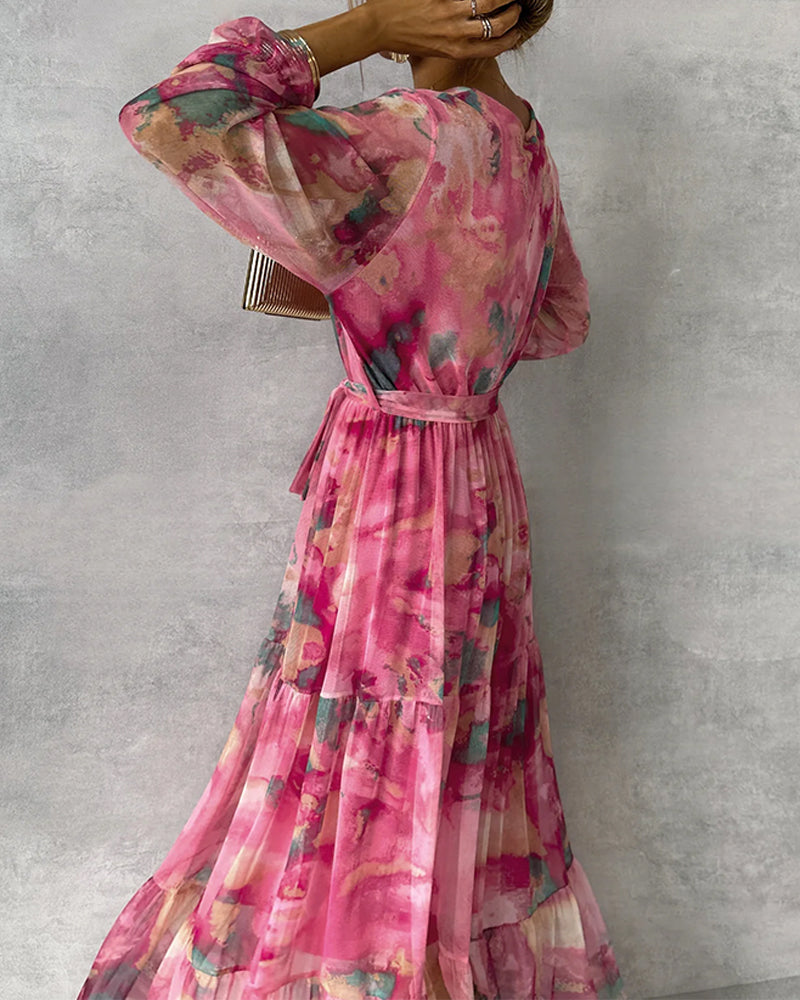Elegantes Maxikleid mit Print und Plissiertem Rock