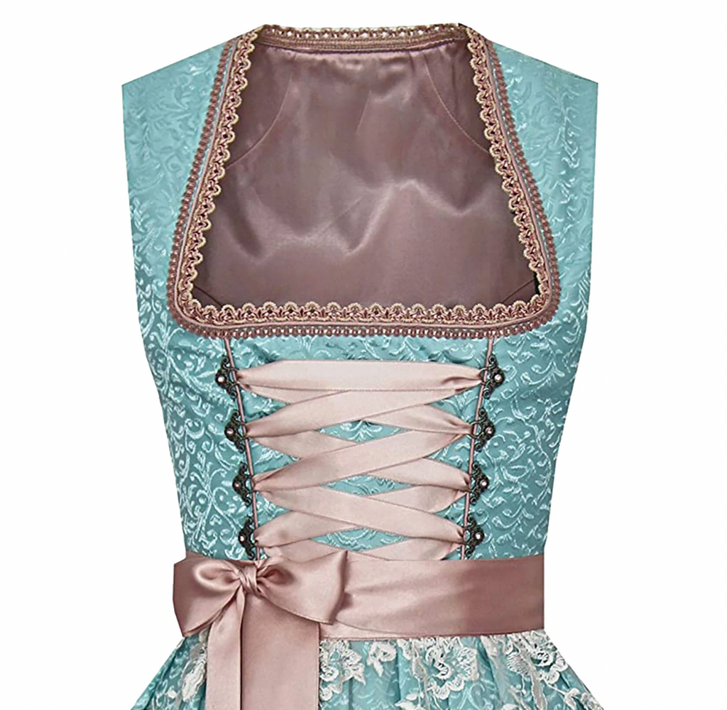 Traditionelles Frauenkostüm mit Schürze und Bluse