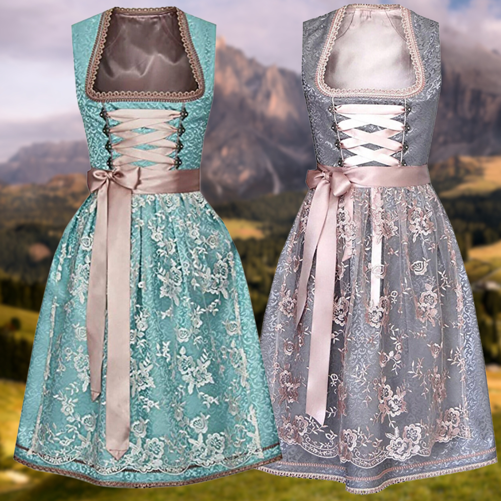 Traditionelles Frauenkostüm mit Schürze und Bluse
